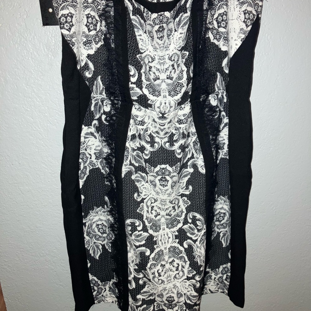 Dress stretching on both sides is size 14